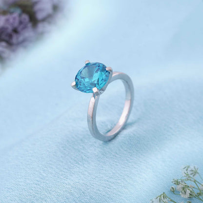 Silver Blue Topaz Diamond Solitaire Ring