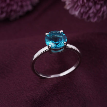 Silver Blue Topaz Diamond Solitaire Ring