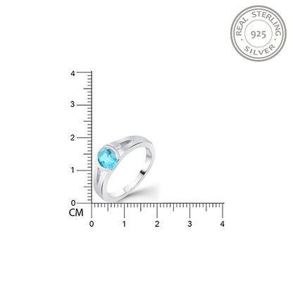 Silver Solitaire Topaz Ring