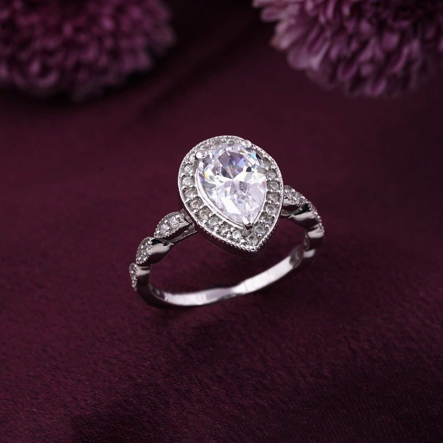 Silver Halo Pear Zircon Ring