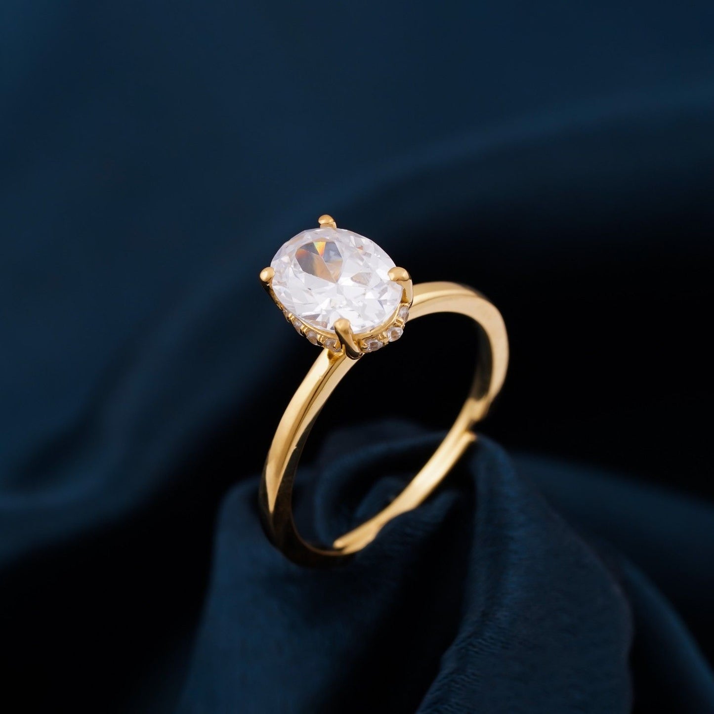 Golden Oval Solitaire Engagement Ring