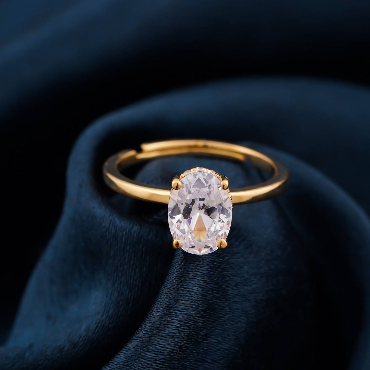 Golden Oval Solitaire Engagement Ring