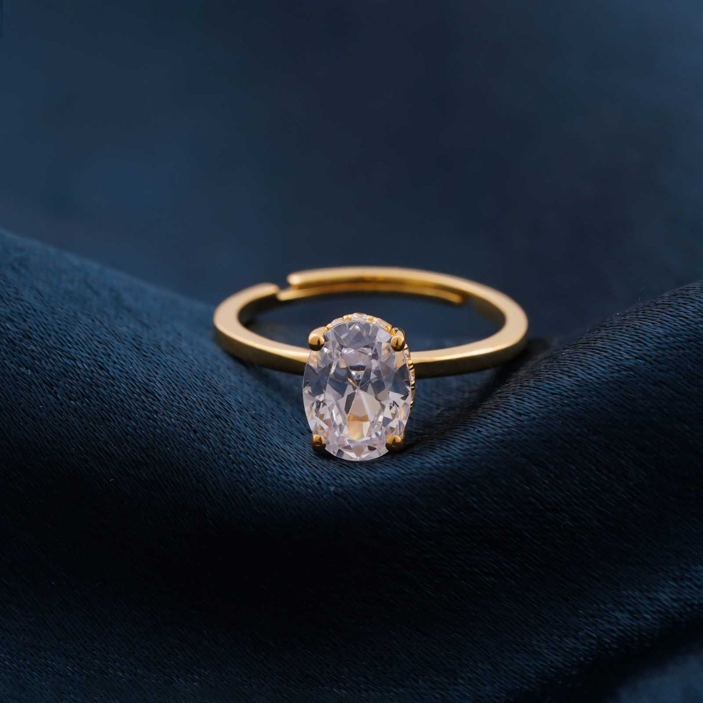 Golden Oval Solitaire Engagement Ring